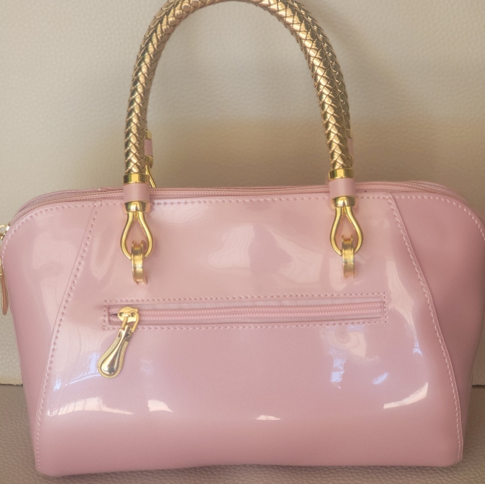 Elegant Pink Handbag with Gold Accents - Picture 5 of 7